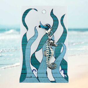 enamel silver seahorse on kelp design card packaging.