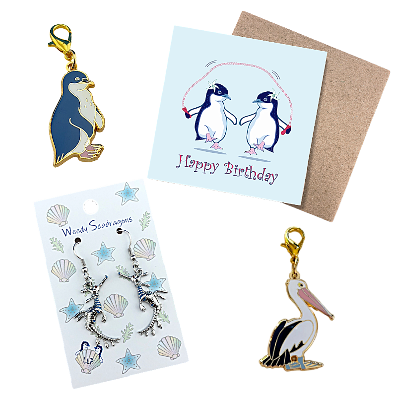 Lucky Little Penguins' sample of charms and cards.