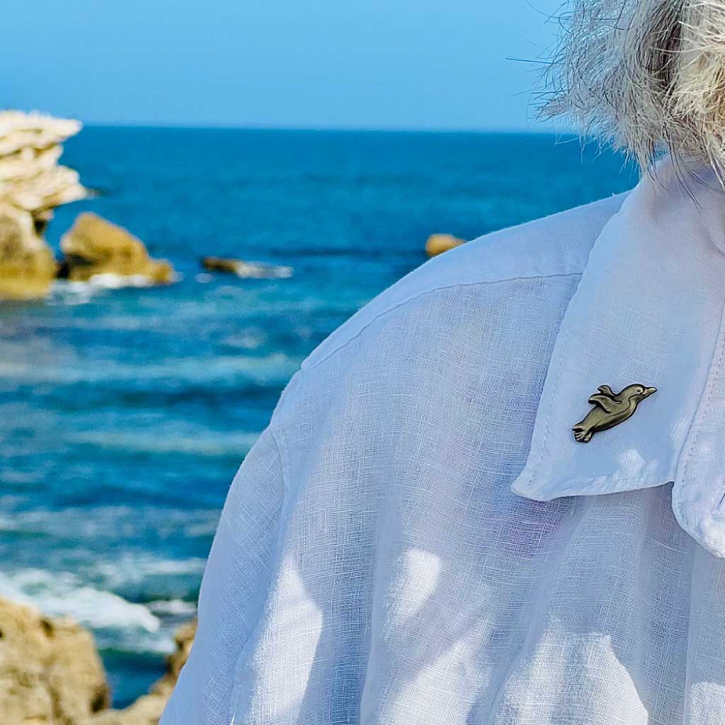 brass penguin pin on collar