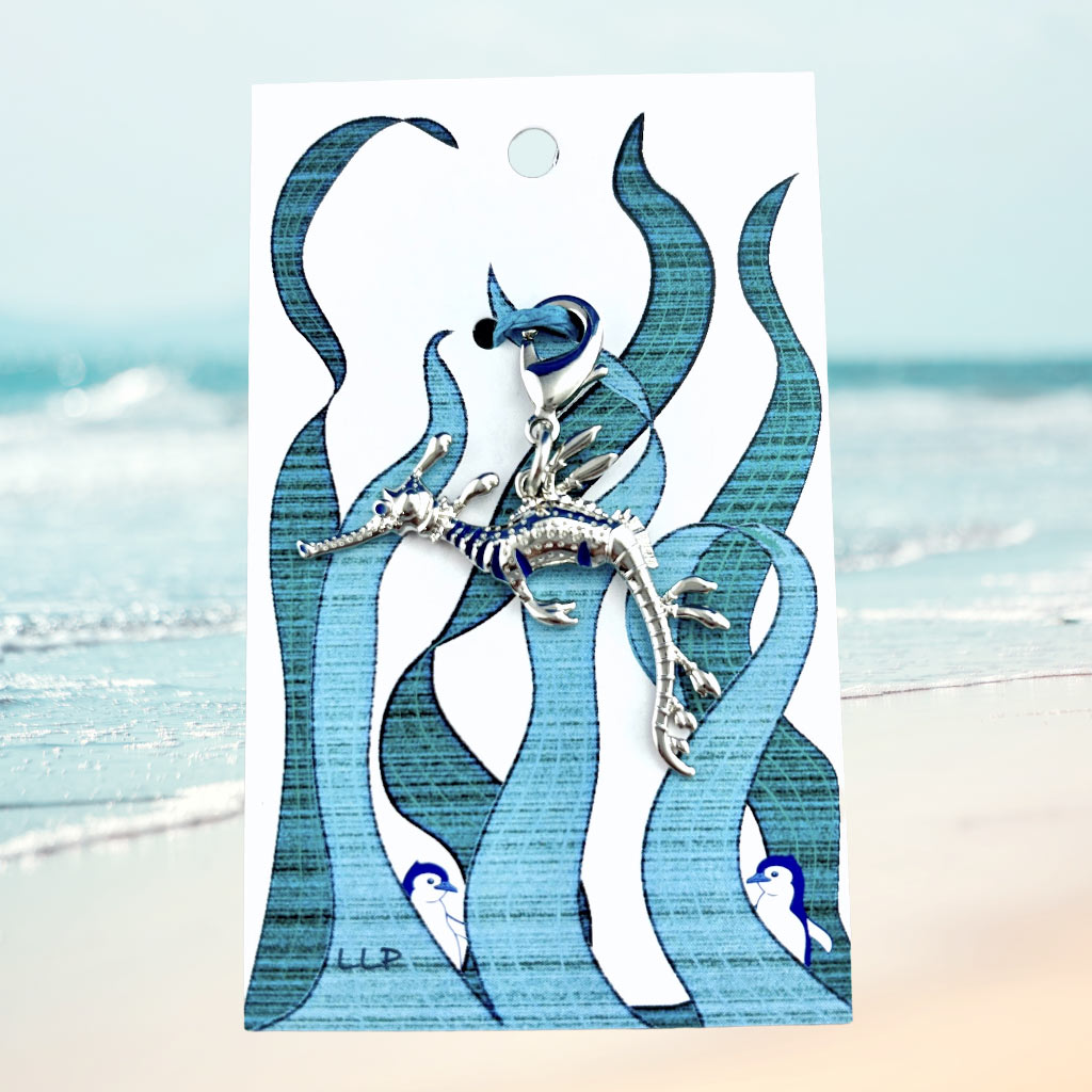 weedy seadragon attached to kelp card