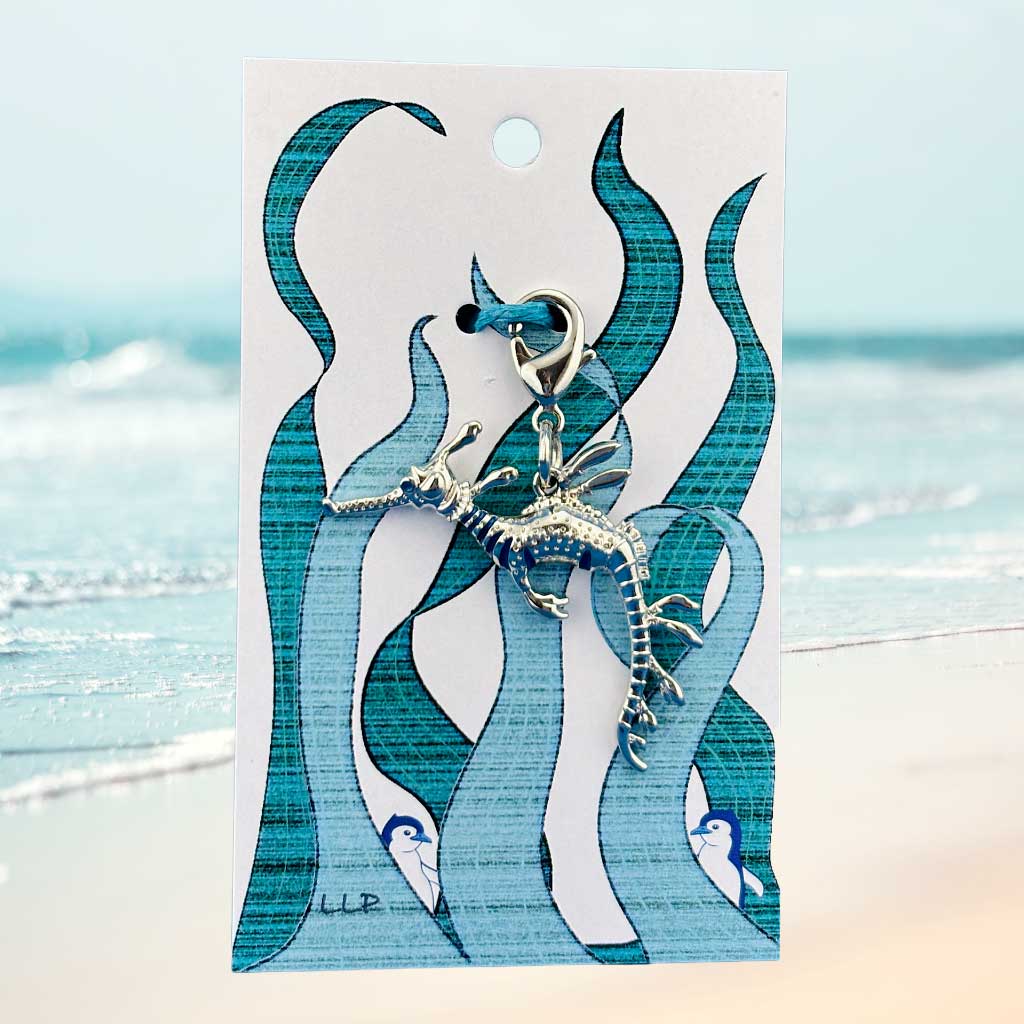 weedy seadragon attached to kelp design card packaging.